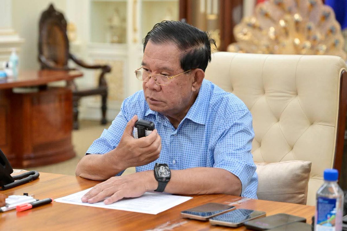Cambodian Senate President Hun Sen posted photos on social media on Thursday showing his war room, and him commanding the battle against Thailand, declaring he's not fleeing, and harshly criticizing Thai politicians and journalists, saying 'Don't Thai to me.'