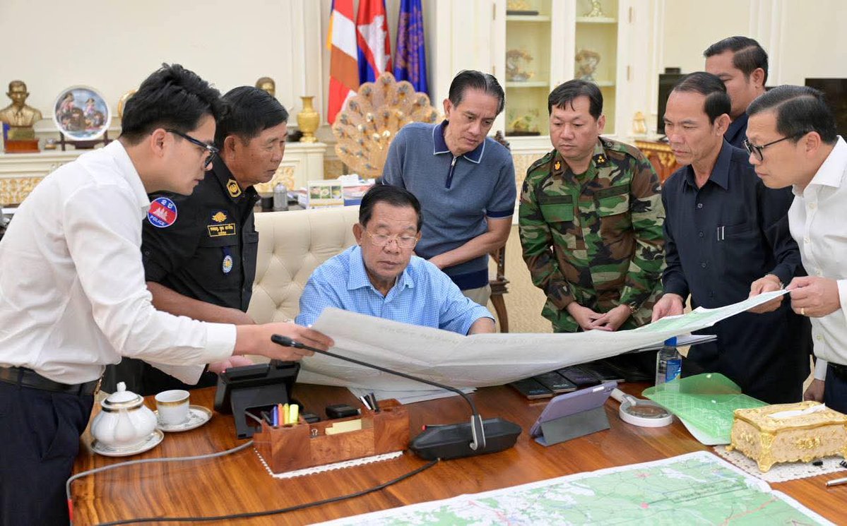 Cambodian Senate President Hun Sen posted photos on social media on Thursday showing his war room, and him commanding the battle against Thailand, declaring he's not fleeing, and harshly criticizing Thai politicians and journalists, saying 'Don't Thai to me.'