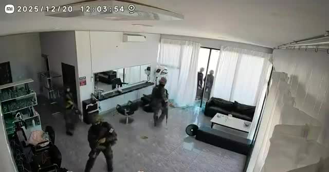 Security footage from Thmor Da showing RTMC marines investigating an abandoned hair salon / barbershop