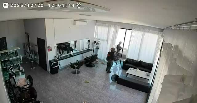 Security footage from Thmor Da showing RTMC marines investigating an abandoned hair salon / barbershop